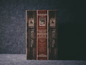 Elegant vintage photo albums displayed with artistic lighting, perfect for memory keeping.